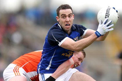 Cavan's Eugene Keating and Declan McKenna of Armagh<br />©INPHO/Ryan Byrne